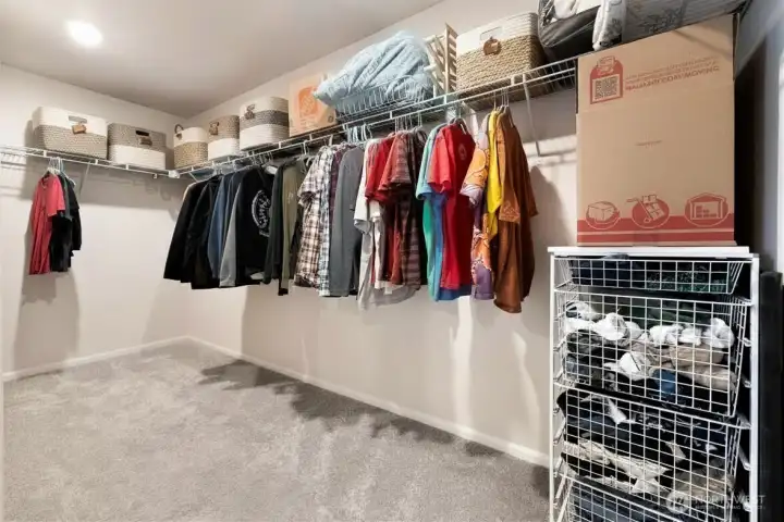 Primary bedroom walk-in closet (wraps around) off of Primary bathroom ensuite