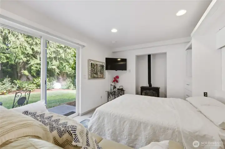Downstairs studio opens to patio (murphy bed shown).