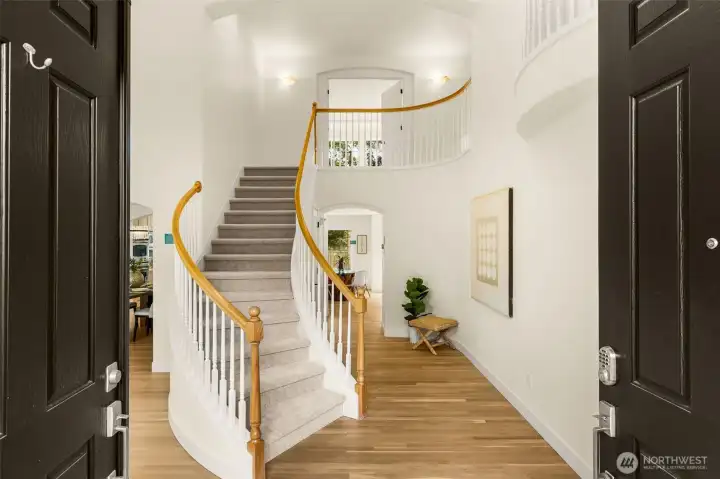 Grand entry with curved staircase. Grand entry with curved staircase.