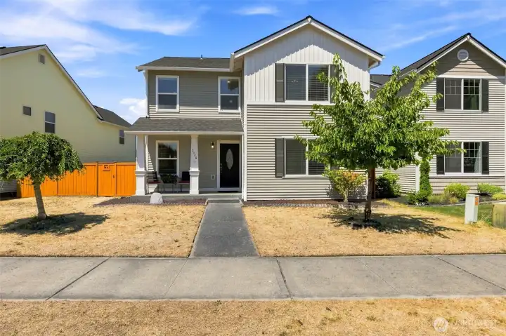 Welcome Home! 4 bedrooms, 2.5 bathrooms, 2,332 square feet, spacious lot, covered cedar deck, mature fruit trees and grape vines, and plenty of flexible space!