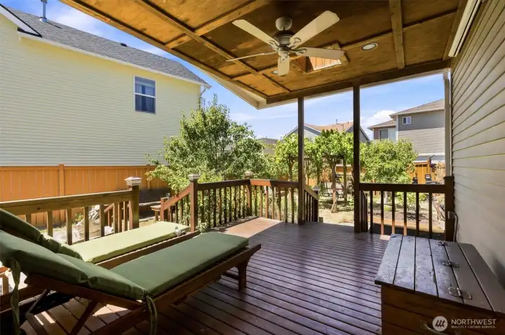 Covered Cedar Deck with a view of the fruit trees and grape vines