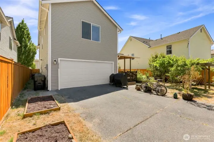 Gated Alley Entry to Driveway and 2-car Garage
