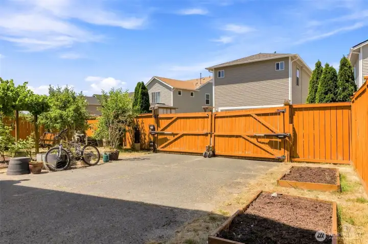 Gated Alley Entry to Driveway and 2-car Garage