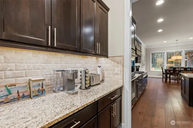 Butler's kitchen is perfect for extra prep or storage space, would also be a great coffee bar!