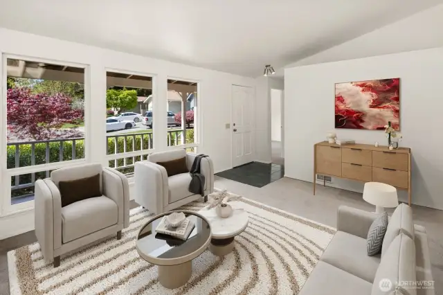 Upon walking in, you have a lovely entrance with a front closet and living room w/ a fireplace.