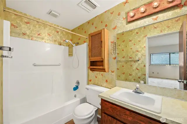 Primary Suite - attached full bathroom with single vanity
