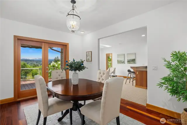 Formal dining room with french doors to the deck.