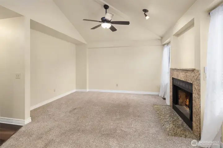 Envision your own furniture here cozied up with a fire in the fireplace watching a Seahawks or Mariner's Game...