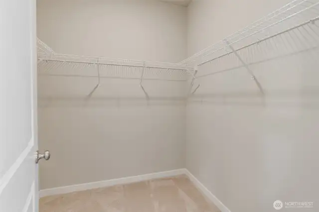 1 of 2 closets in the primary suite