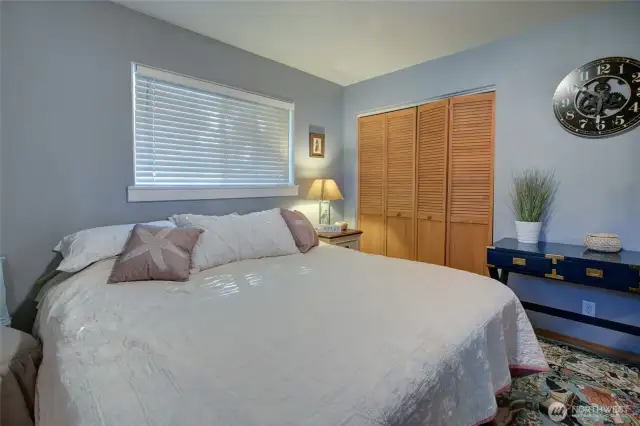 Cozy and comfortable space, perfect for a restful night. Home is equipped with horizontal blinds throughout.