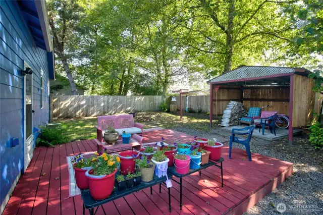 The inviting deck is the perfect spot for morning coffee or evening chats.