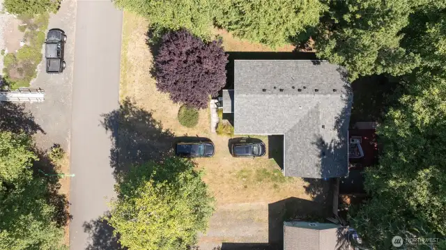 Beautifully treed lot. New 30-year composition roof installed in 2021. Gutters are equipped with Leaf Filter Gutter Guard.