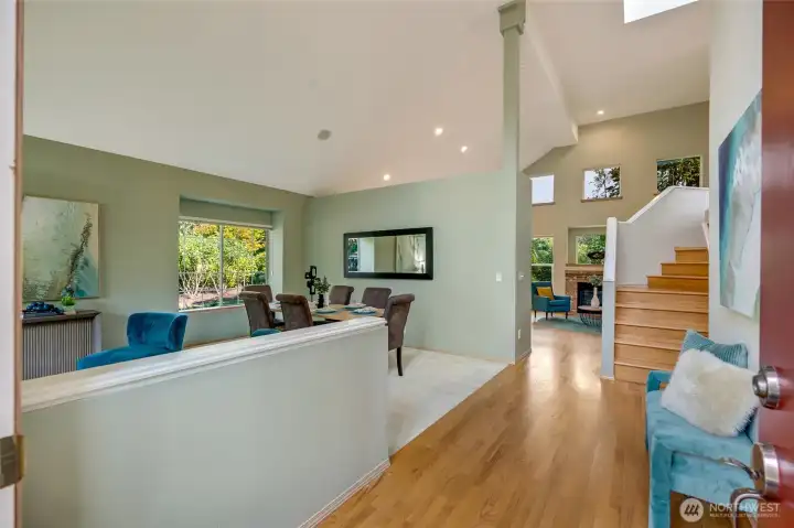 Hardwood floor at entrance, formal living and dining rooms off to the left.
