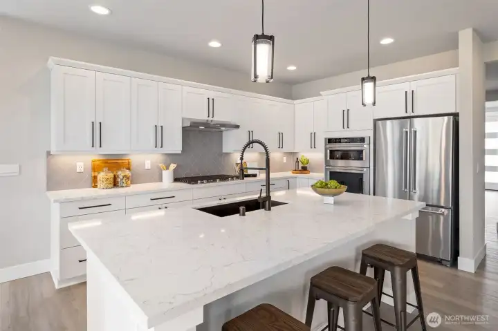 Photos are of a home in a different community and are for illustration purposes only to reflect typical finishes.  May depict seller enhancements.  Colors and options may vary.