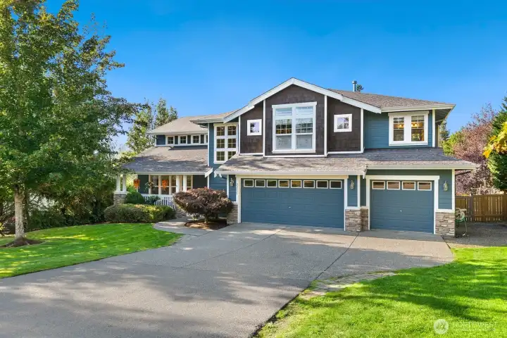 Situated on an incredible lot, just shy of an acre