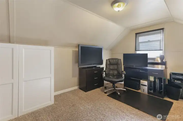 Upstairs third bedroom used as home office