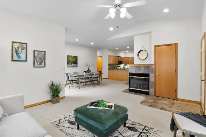 Living room flows into the dining room and kitchen