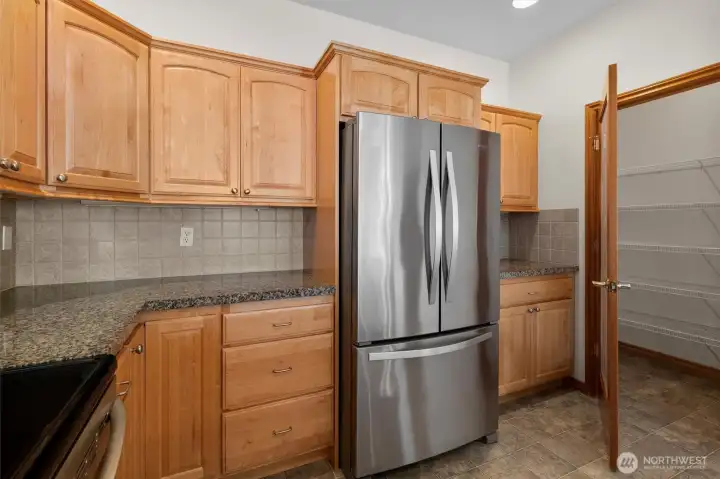 Updated kitchen with large walk in pantry.