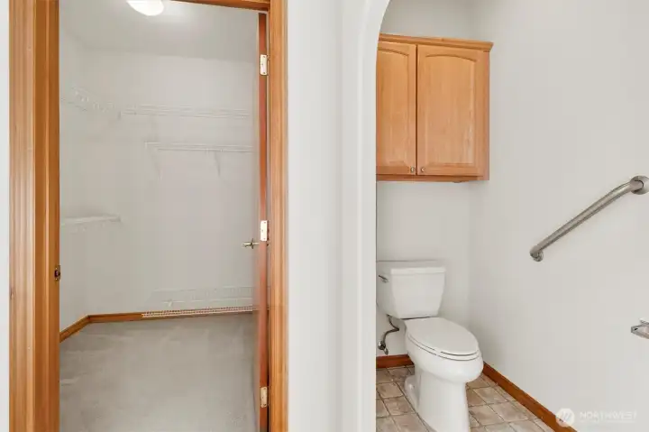 Primary bathroom with grab bar installed.
