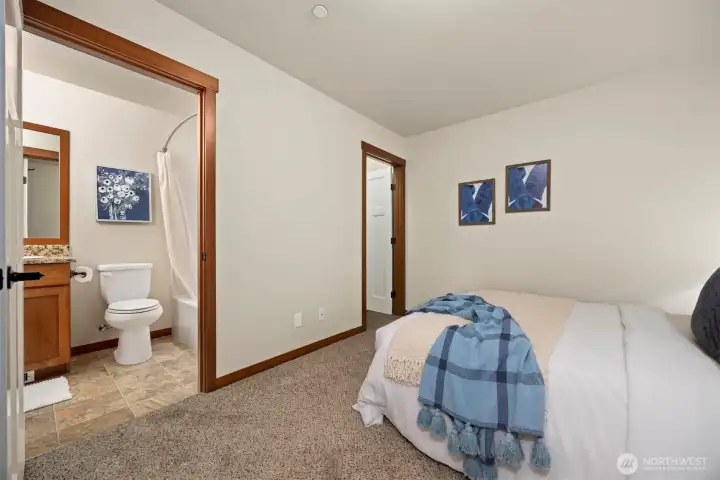 Alternate view of the second bedroom, with bathroom access and it's own walk in closet.