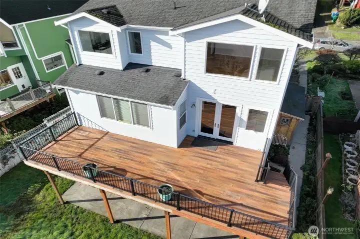 Views also from Primary suite and updated kitchen which nicely connect to the view deck