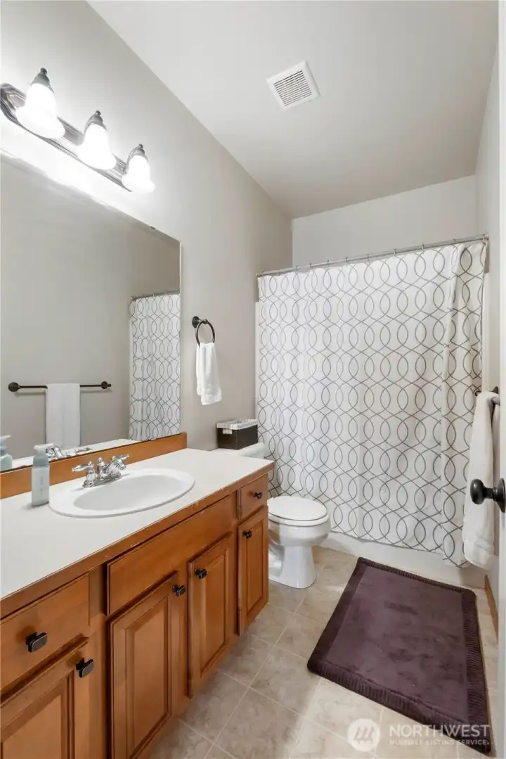 One of the 3 full bathrooms.