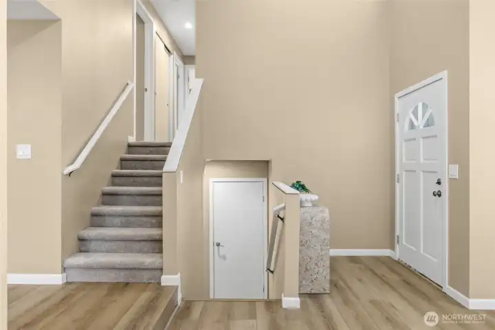 Welcoming entry with a layout that makes it easy to move through the home, connecting both upper and lower living spaces.