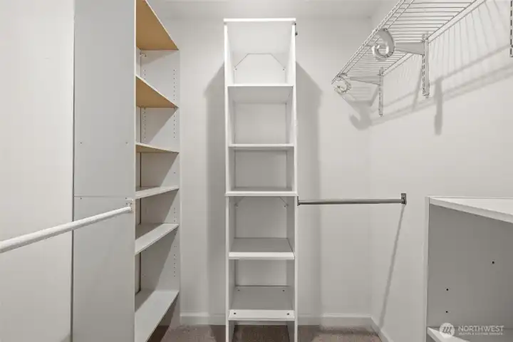 Walk-in closet with built-ins to keep everything organized and within reach.