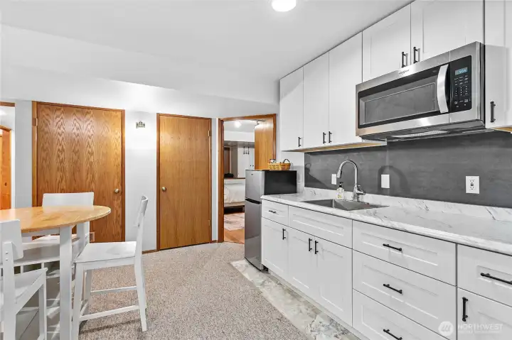 Daylight basement - kitchenette.  The lower level is the perfect space for multi-generational living, guest accomadations, or to rent out