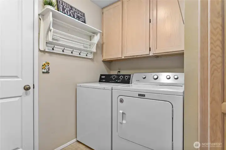 Laundry and access door to garage