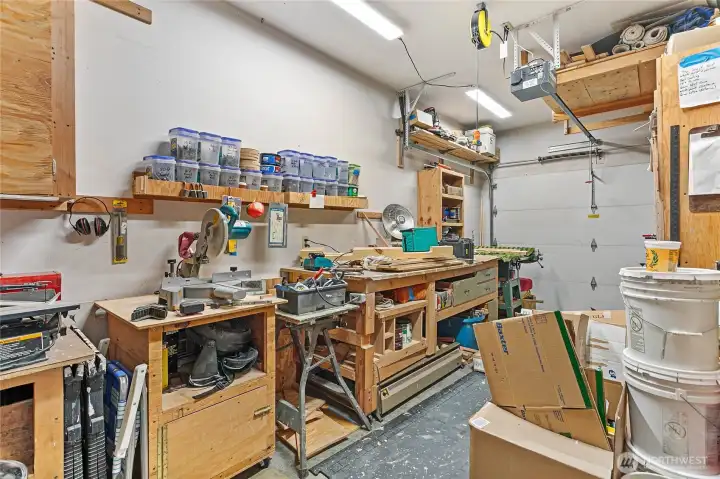 Half of the garage was made into a special wood working shop.  Upon request everything can be removed and wall taken out.