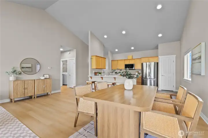 Easy flow from living room, connecting dining, kitchen and entry hallway