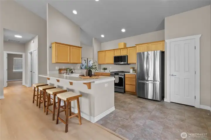Great kitchen with newer fridge, oven, microwave and dishwasher and garbage disposal PLUS walk-in pantry