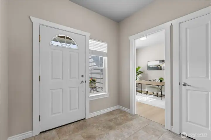 Entry gives way to flex room, perfect for a quiet and quiet office space.