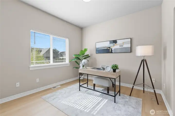 Flexible room ideal for home office, den, or guest space with window for natural light