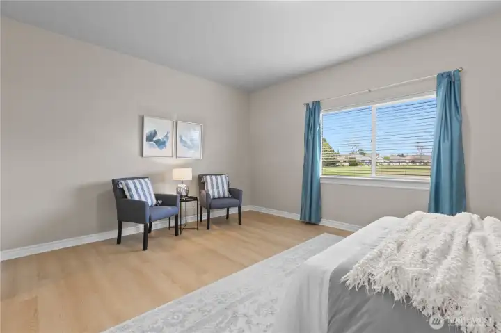 Alternate primary bedroom view with space for seating or additional furnishings