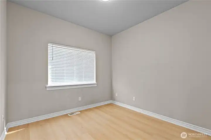Third bedroom with window and closet potential, ready for customization