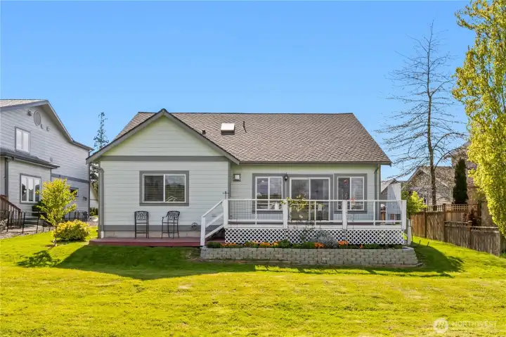 A large deck off the living room make indoor/outdoor living and easy part of daily routine