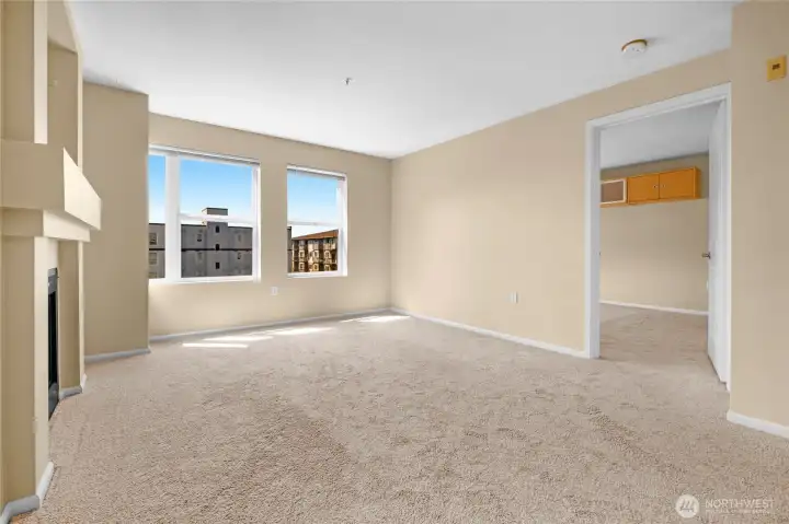 Living area with entrance to Primary bedroom