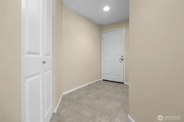 Entry way with hall closet