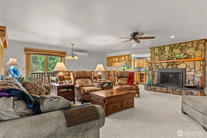 Large upstairs living room with propane fireplace