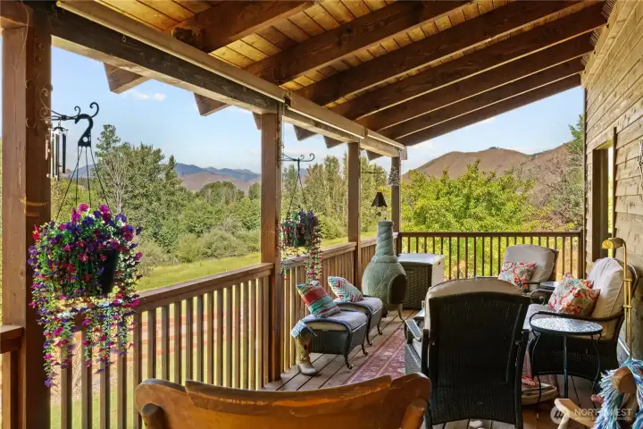 Expansive redwood deck with chiminea metal propane fireplace