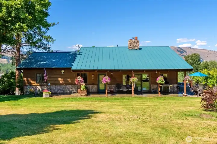Tranquil setting with covered patio for year round enjoyment