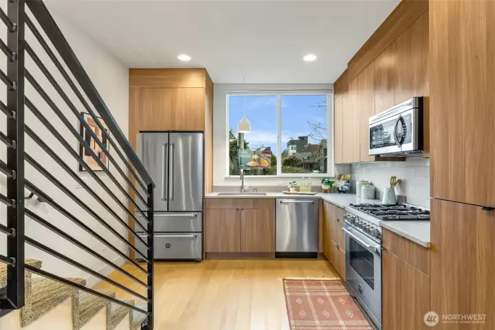 Kitchen is open to the dining and has windows to the west.