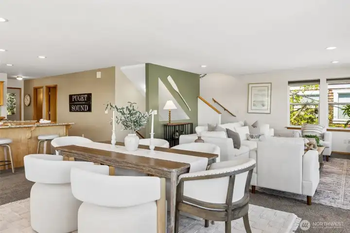 The main level features dining, kitchen and living areas.