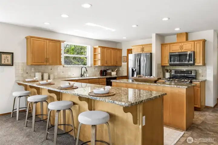 Spacious kitchen with  gas stove and separate pantry.