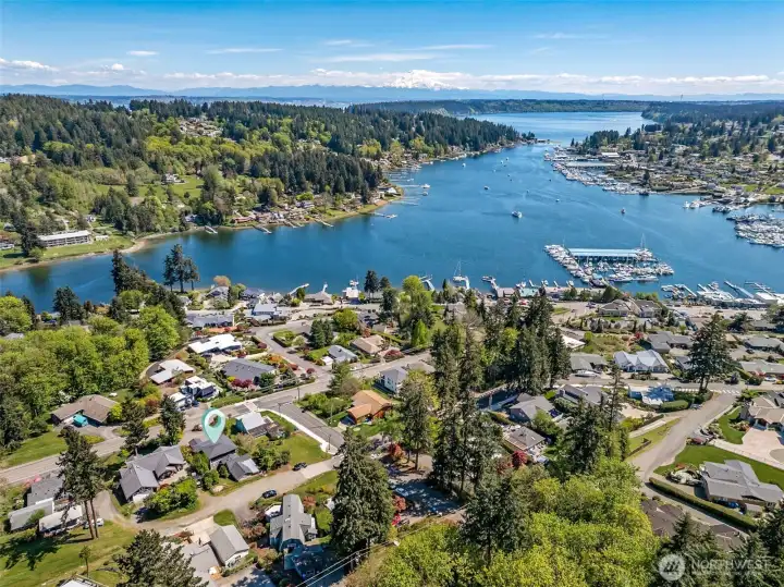 Another bird's eye view of the property with the home in the foreground.