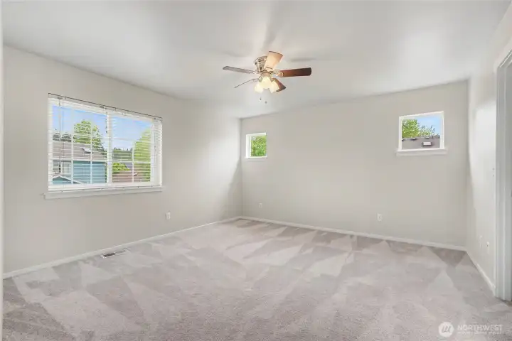 Primary suite with walk in closet.