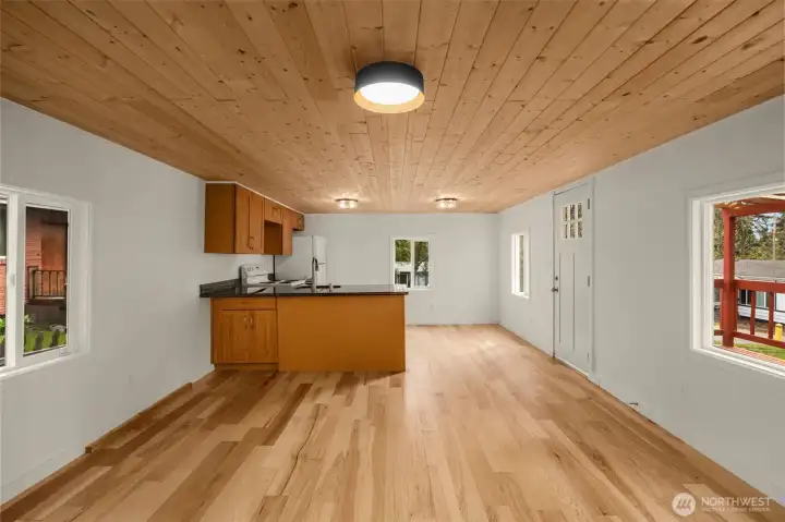 Large living room and kitchen space without virtual staging.