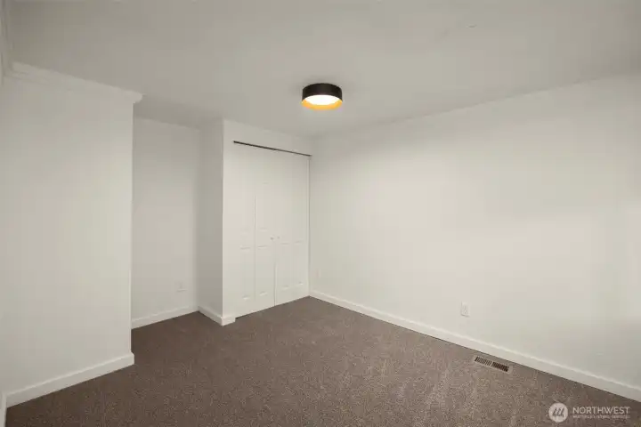 Another view of the primary bedroom